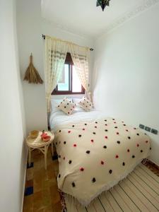 Postel nebo postele na pokoji v ubytování DAR ADIL KASBAH