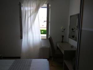 מיטה או מיטות בחדר ב-B&B Villa Oasa 2
