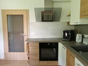 Dapur atau dapur kecil di Apartment Hörmann