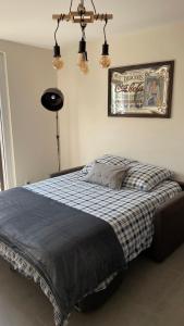 Postel nebo postele na pokoji v ubytování Le Pic Noir
