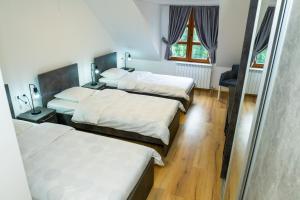 Postel nebo postele na pokoji v ubytování Guest House Alte