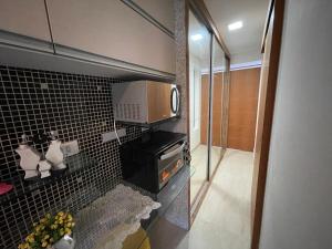 Køkken eller tekøkken på Winterville Gravata Flat Lindo + 4 billeder