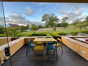 En balkon eller terrasse på Winterville Gravata Flat Lindo