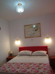 Posteľ alebo postele v izbe v ubytovaní Residence LA VELA fronte mare + 37 fotografií