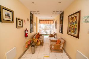 Khu vực ghế ngồi tại Hotel La Coruña +4 ảnh