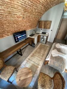 an overhead view of a living room with a kitchen at Alma Port Suites in Istanbul