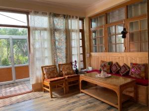 Posezení v ubytování Saiman Guest House