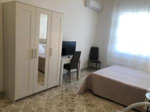 B&B Nonna Fifina客房内的一张或多张床位