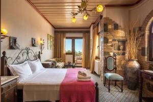 Postel nebo postele na pokoji v ubytování Panorama Exclusive Suites + 37 fotografií