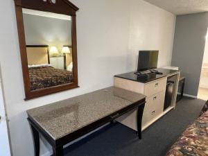 Kuchyň nebo kuchyňský kout v ubytování Executive Inn