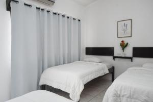 Voodi või voodid majutusasutuse Hotel Cañas toas