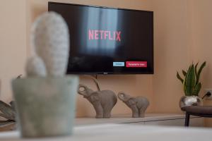 A television and/or entertainment centre at Libyan Sea Luxury Apartment 1