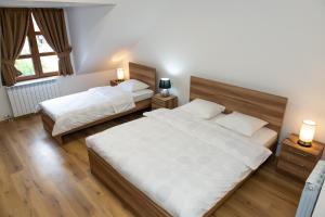Postel nebo postele na pokoji v ubytování Guest House Alte