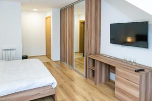Postel nebo postele na pokoji v ubytování Guest House Alte