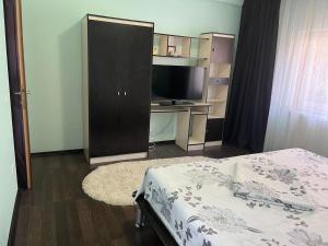 Postel nebo postele na pokoji v ubytování Casa Vio parter