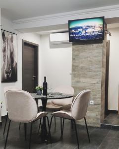 Televízia a/alebo spoločenská miestnosť v ubytovaní Apartment Marino Split + 18 fotografií