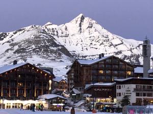 Tignes Joli Studio avec vue imprenable sur le lac взимку