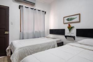 Voodi või voodid majutusasutuse Hotel Cañas toas