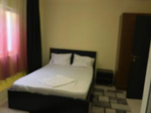 Postel nebo postele na pokoji v ubytování Casa Vio parter