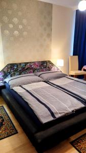Ένα ή περισσότερα κρεβάτια σε δωμάτιο στο Leander Vendeghaz