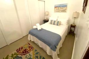 Postel nebo postele na pokoji v ubytování KASA Charming Luna 2 bedroom