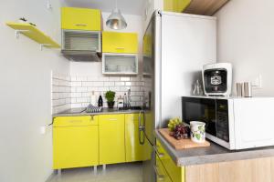 Kuchyňa alebo kuchynka v ubytovaní P&O Serviced Apartments - Dionizosa + 6 fotografií
