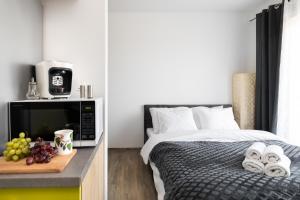 Posteľ alebo postele v izbe v ubytovaní P&O Serviced Apartments - Dionizosa