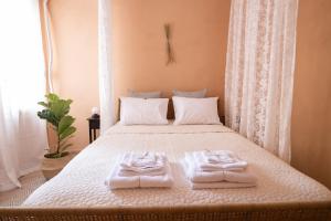 Postel nebo postele na pokoji v ubytování Mediterranean house - 12 min from Acropolis!