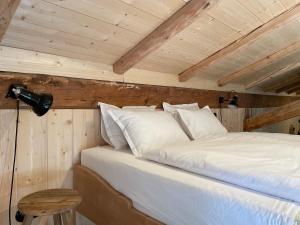 Postel nebo postele na pokoji v ubytování STUBN in der Frasdorfer Hütte