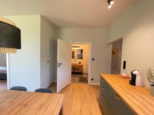 Kuchyň nebo kuchyňský kout v ubytování Apartament Luna