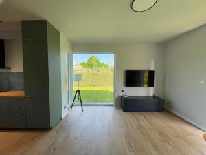 TV a/nebo společenská místnost v ubytování Apartament Luna