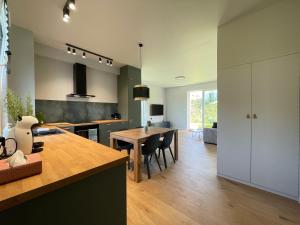 Kuchyň nebo kuchyňský kout v ubytování Apartament Luna