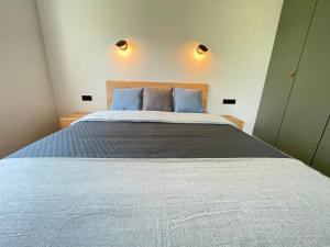 Postel nebo postele na pokoji v ubytování Apartament Luna