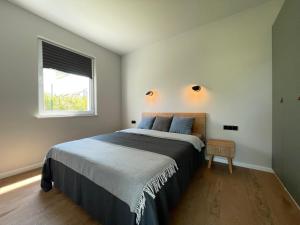 Postel nebo postele na pokoji v ubytování Apartament Luna