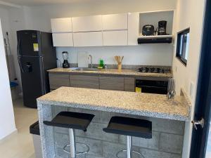 Una cocina o zona de cocina en Apartamento 3 Alcobas Oeste Cali -301