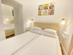 Posteľ alebo postele v izbe v ubytovaní Steiner Residences Vienna Taborstrasse