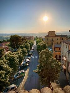 a view of a street with cars parked on the road at B&B Terrazza Sul Borgo in Mogliano