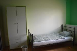Postel nebo postele na pokoji v ubytování Hostel kmetija Frangež