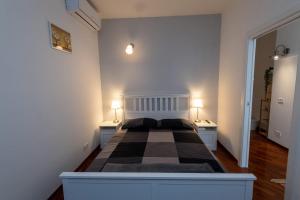 Postel nebo postele na pokoji v ubytování SUITE184
