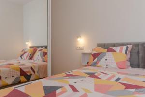 Posteľ alebo postele v izbe v ubytovaní Super modern Apartment Gold, Beautiful View