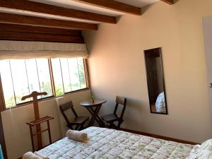 Postel nebo postele na pokoji v ubytování El Refugio de Barranco