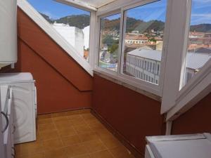 A balcony or terrace at Ático con vistas al mar Garaje y Wi-Fi
