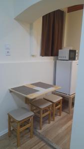 Kuchyňa alebo kuchynka v ubytovaní Magnolia apartman