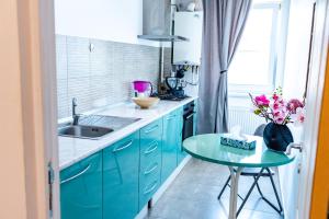 A kitchen or kitchenette at Thome Hoia Studio 1Bedroom