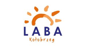 a logo with a letter q and aaa rotoria at LABA Kołobrzeg DIVA Apartament Prywatny in Kołobrzeg