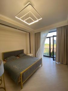 Katil atau katil-katil dalam bilik di Alvina complex Tsakhkadzor
