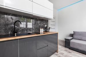 Kuchyňa alebo kuchynka v ubytovaní Apartament Nadia