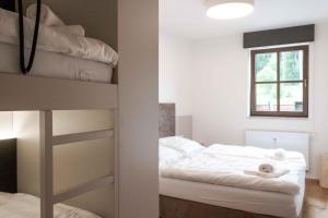 Posteľ alebo postele v izbe v ubytovaní Wellness Apartmán Pila Kvilda