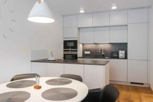 Kuchyňa alebo kuchynka v ubytovaní Wellness Apartmán Pila Kvilda