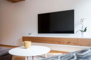 Televízia a/alebo spoločenská miestnosť v ubytovaní Wellness Apartmán Pila Kvilda